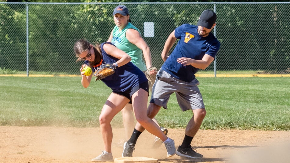 Tough Competition at third base at the UVA Anesthesiology vs. Peds Annual Softball game
