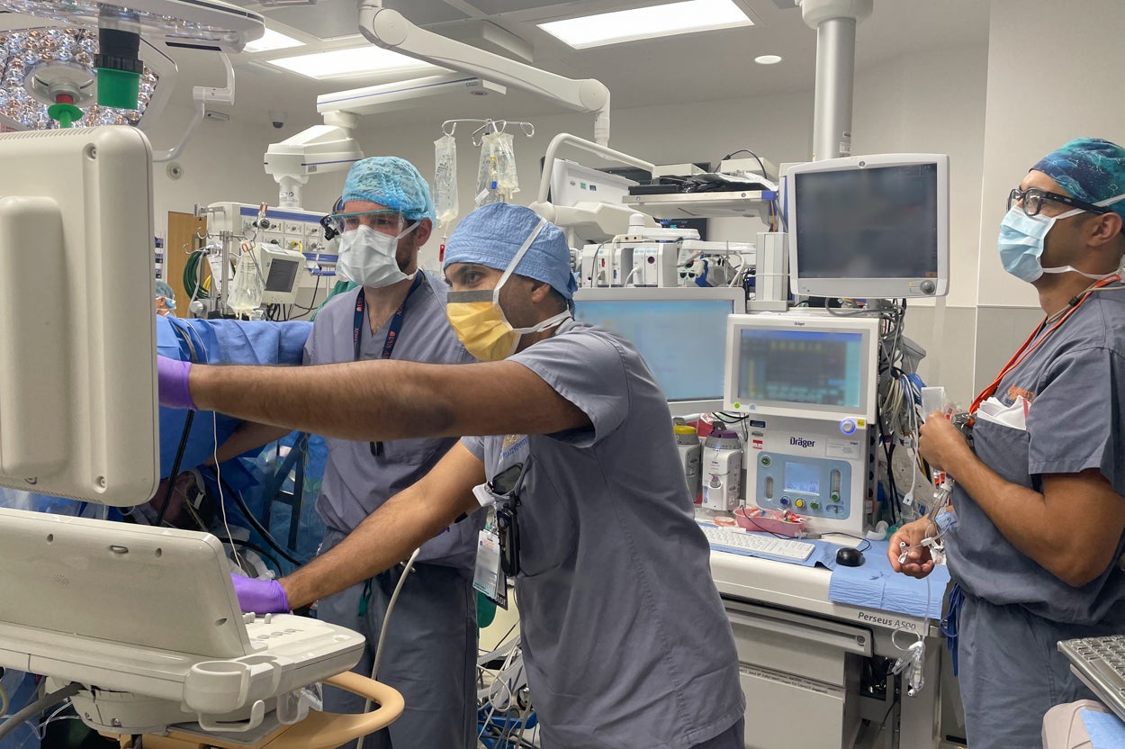 University of Virginia Anesthesiologist Dr. Venkat Mangunta teaches residents in the cardiac operating room.