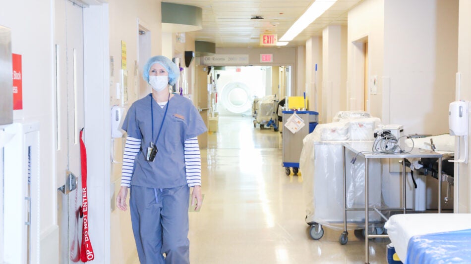 University of Virginia Anesthesiologist Jessica Sheeran heads to see her patient in the OR.