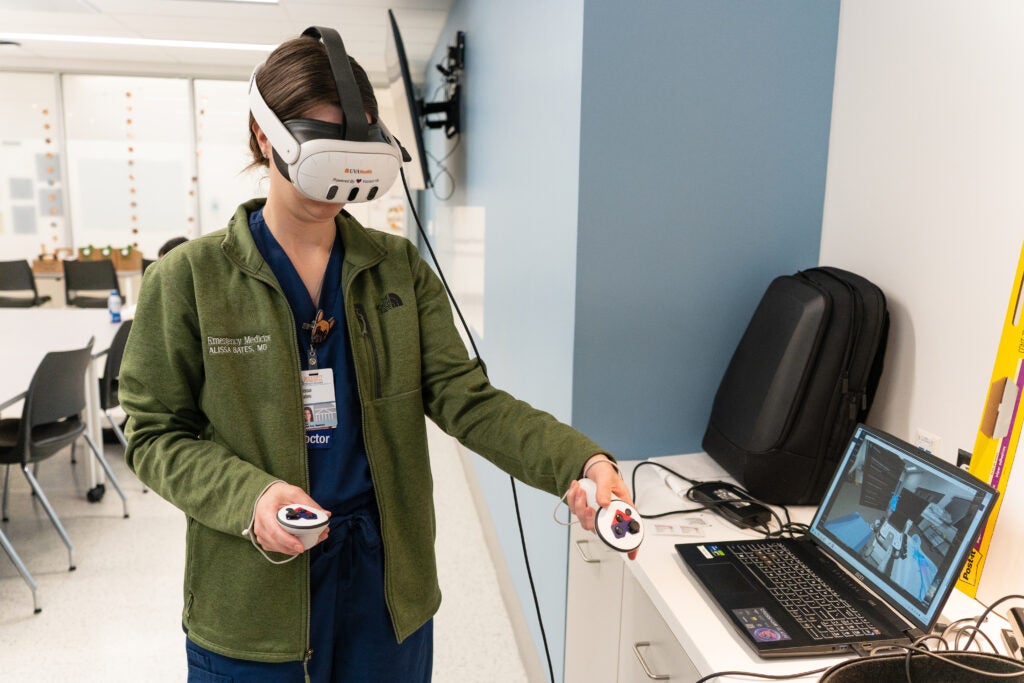 Critical Care Fellow, Alissa Bates, MD practicing a procedure in VR.