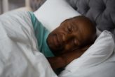 Older African American man sleeping
