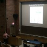 Picture of Sarah Kucenas presenting her work on zebrafish at UVA symposium.