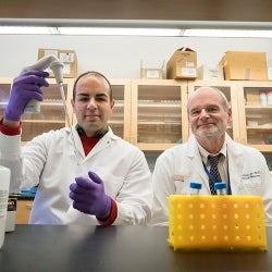 Researcher Mahmoud Saleh and William Petri Jr., MD, PhD.