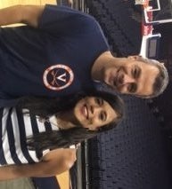 Photo of Cecilia Dieuzeide and her Father in UVA basketball court