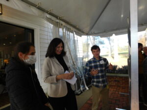 Dr Anja Bielinsky viewing Arun Dutta's Poster