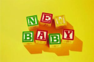 building blocks spelling new baby 
