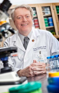 UVA Comprehensive Cancer Center Director and TOBCRI co-lead Dr. Tom Loughran in the lab