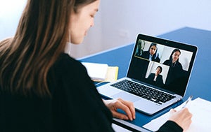 A virtual meeting using a notebook computer