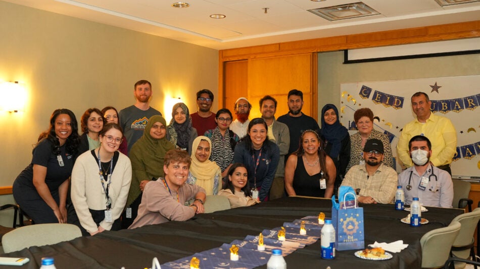 UVA Comprehensive Cancer Center team members gather at the Eid celebration.