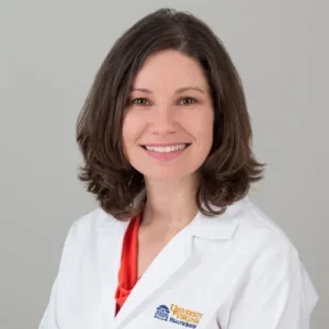 A person in a white coat