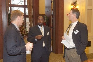 Sean Joe, Wade Myers, and Chris Holstege discuss the proceedings during a break.