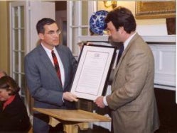 Delegate Robert Hurt of the Virginia House of Delegates presents CIAG Executive Director Greg Saathoff with a Virginia General Assembly Commendation in recognition of CIAG's work on "Community Shielding."