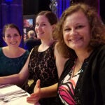 Jacqueline, Stephanie, and Asya at the IPNC 2016 banquet, Manchester Cathedral, UK