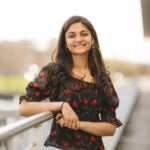 Madhuri Podugu, a systems engineer, posing for a professional headshot