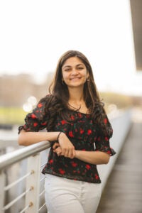 Madhuri Podugu, a systems engineer, posing for a professional headshot