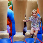 child on a bounce house