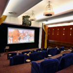 children watching a movie in a theater