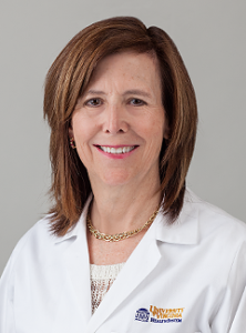 doctor Sara Sutherland wearing her white lab coat