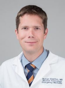 portrait of Dr. Nathan Charlton in his white coat