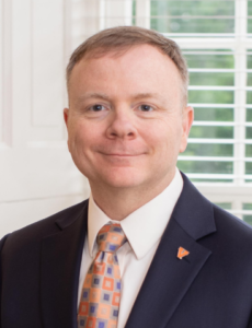 portrait of Daniel Griffith at awards ceremony