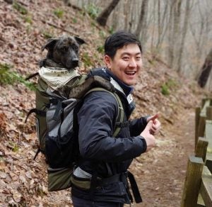 Winston backpacking with his dog