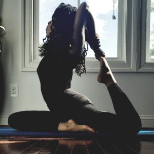 Dr. Ibilibor practicing yoga