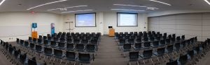 Photo: Education Resource Center Room A at UVA Health. Seats set up facing dual projection screens.