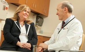 Photo of Doctor consult with patient