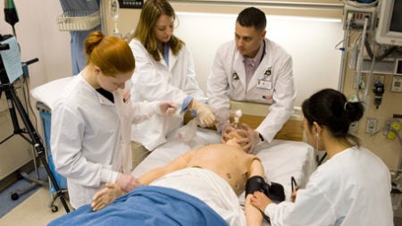 Group of residents and students in the Simulation Center
