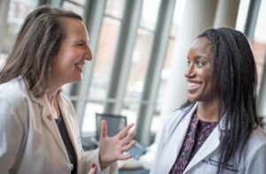 Meg Keeley and Medical student talking