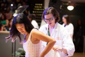 a new UVA medical student receiving their white coat