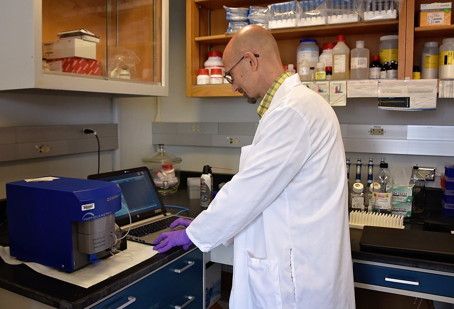 lab member working on a computer