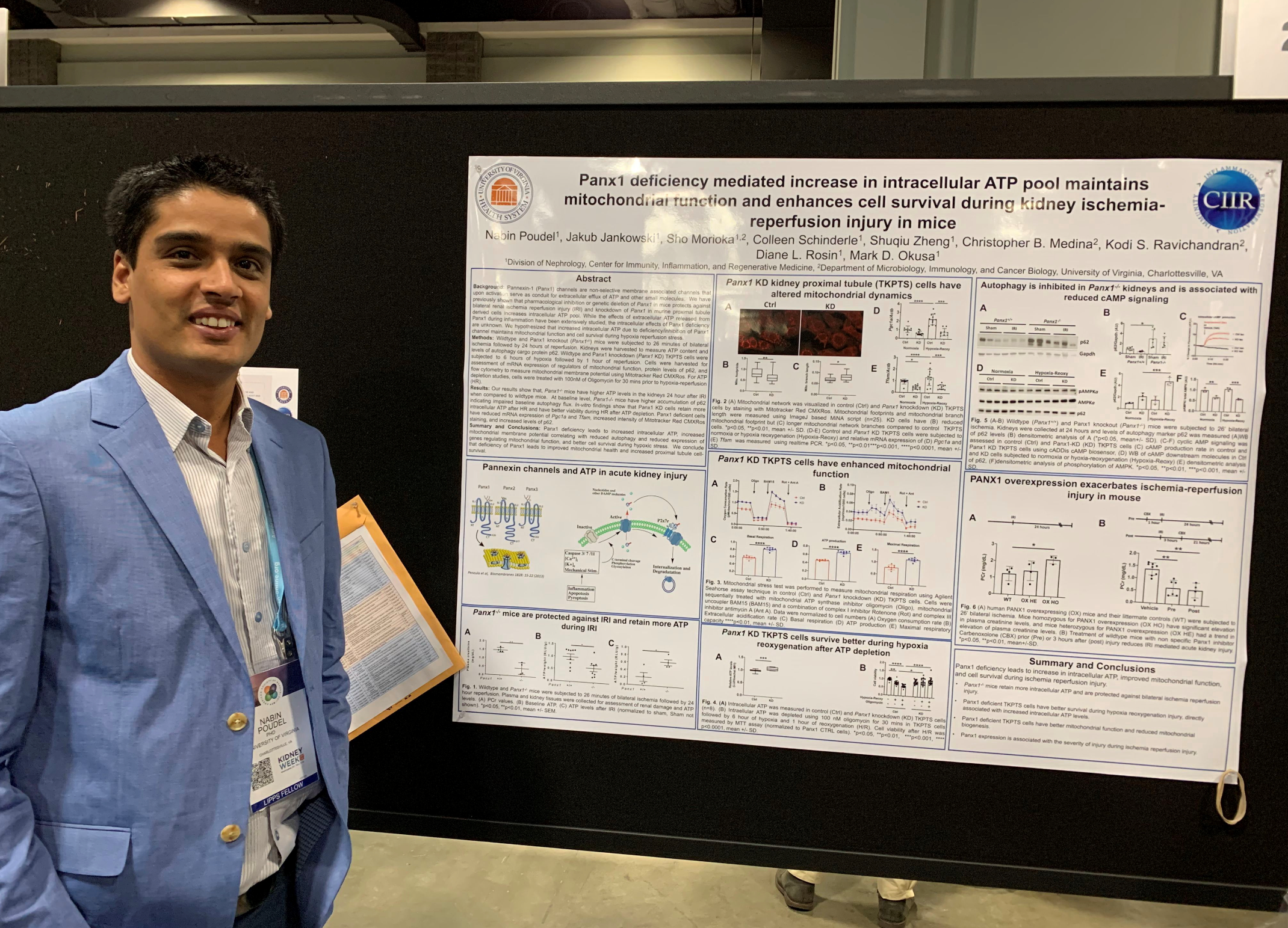 Researcher with poster