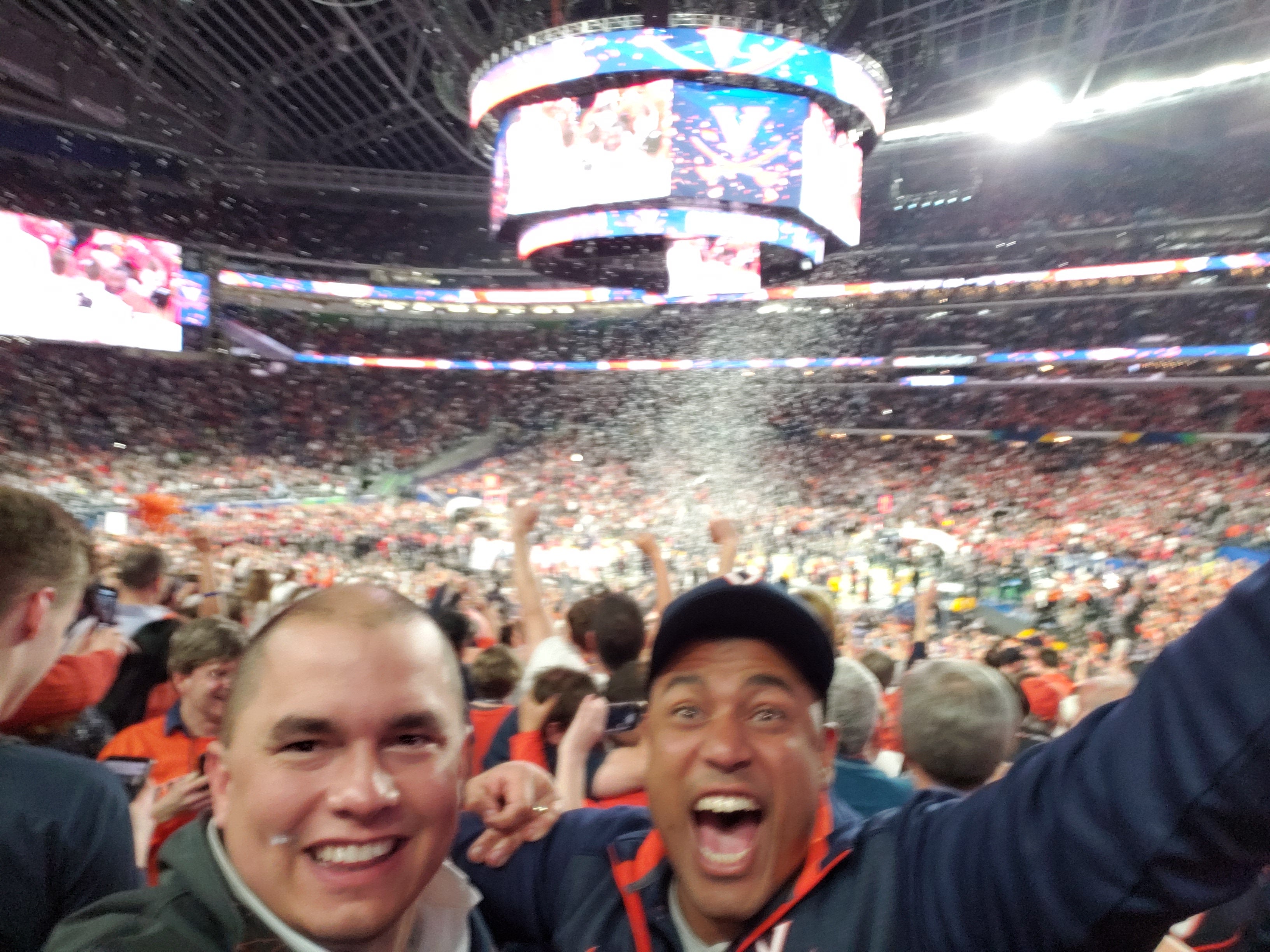 John Awowale helps the UVA basketball team bring back the National Championship Trophy