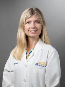 Dr. Anne Mills