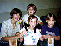 photo of child with cerebral palsy and family