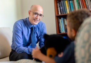 Dr. Jim Tucker interviewing a young child