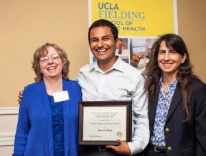 Dr. Alcala celebrates with Dr. Anne Pebley, Professor of Community Health Sciences and Sociology, and Dean Jody Heymann, both of the UCLA Fielding School of Public Health.