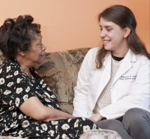 student interacting with a patient