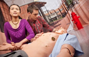 a students working with a simulator