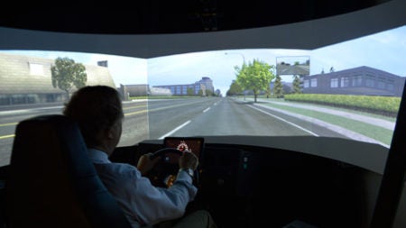 Man in driving simulator