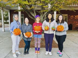 Residents with pumpkins