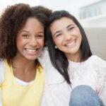 Two friends hugging