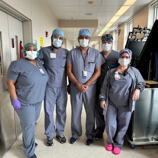 Fellow Naima Farah, Fellow Ibrar Islam, IP attending and mentor Subodh Pandey pose with the Bronschoscopic Lung Volume Reduction team in service of patients with advanced COPD
