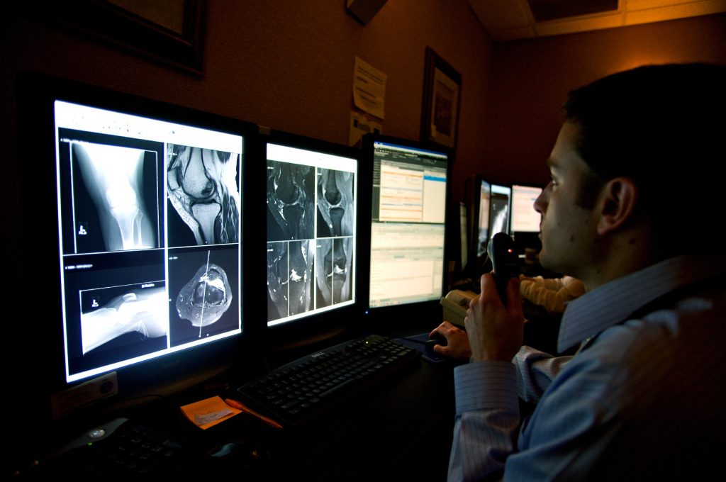 UVA Radiologist Talking into Microphone