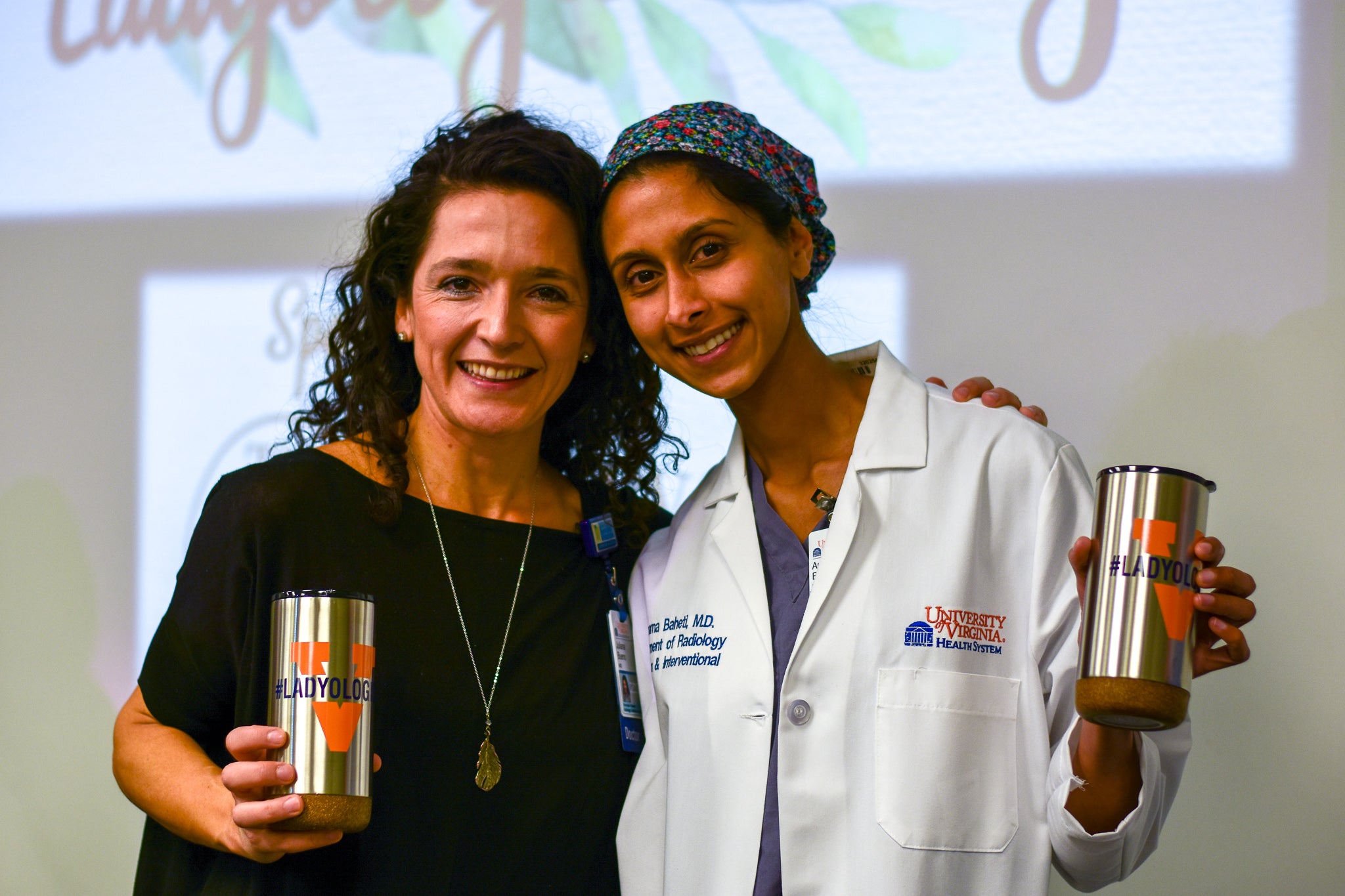 UVA Radiology's Director of ladyologist events with ladyologist cup