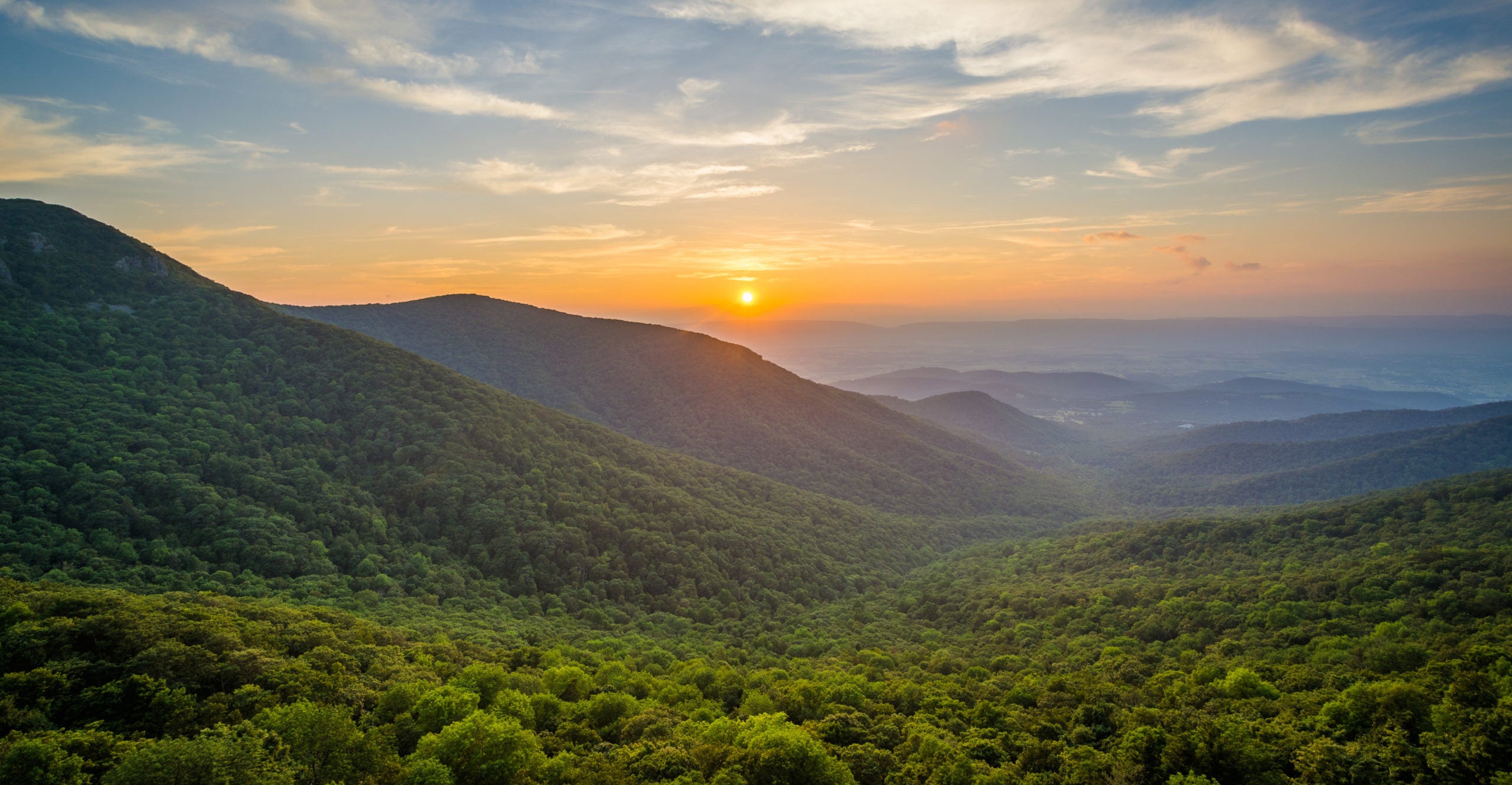 Image of sunset over Shenandoah National Park, located just east of Charlottesville