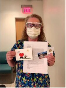 UVA Radiology MRI Nurse Cindy Lourenzo poses with her RAD-ICAL Award