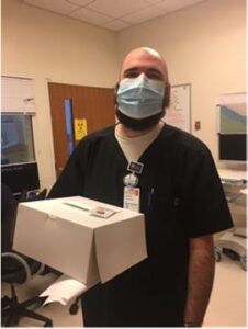 UVA Radiology Nuclear Medicine Technologist Matt Calvarese poses with his RAD-ICAL Award