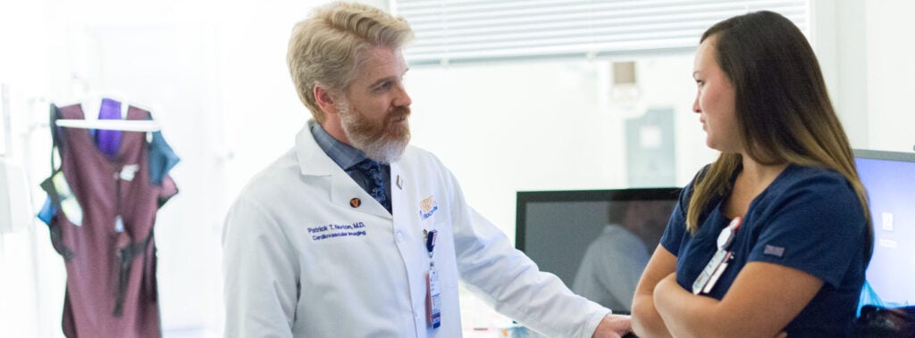 Dr. Patrick Norton, UVA Radiology faculty member, discusses a patient